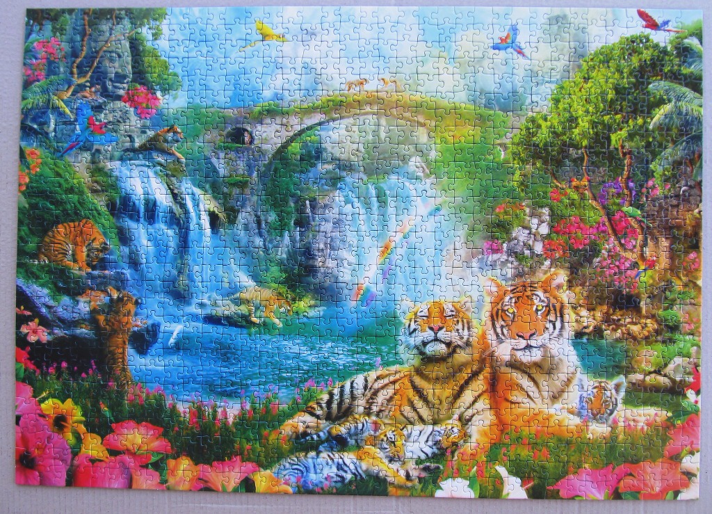 A lush jungle scene with tigers and a waterfall