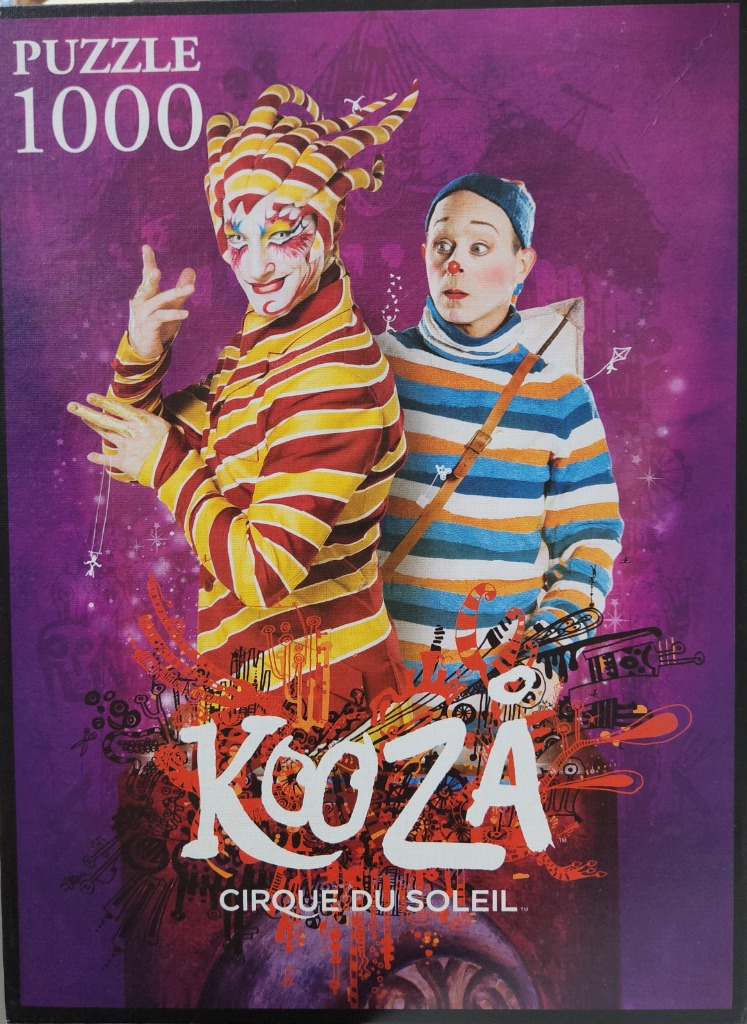 Two performers in theatrical costumes against a purple background with artistic illustrations