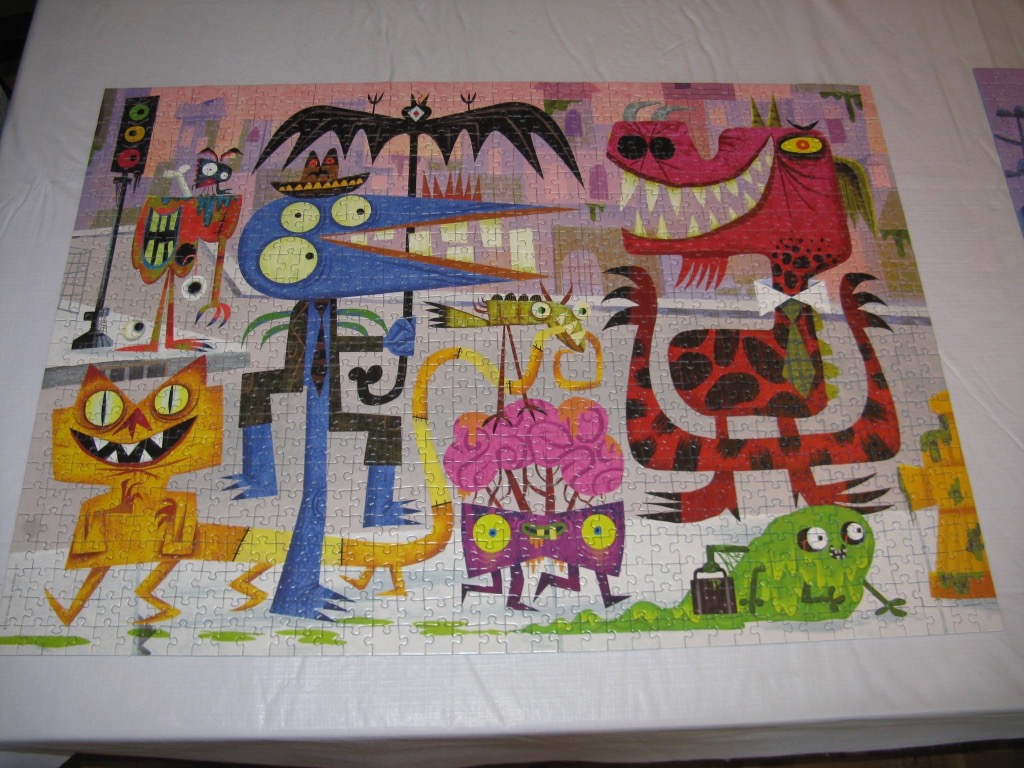 A whimsical illustration of several quirky monsters in a city street scene.