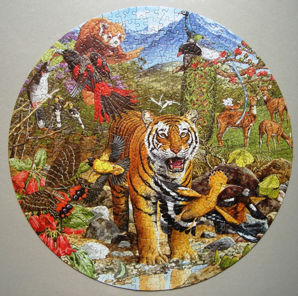 Circular illustration of a tiger in a lush jungle with various birds, deer, and exotic flora.