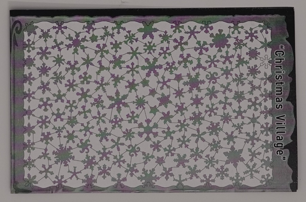 A repeating pattern of intricate snowflakes in shades of purple and green on a white background.