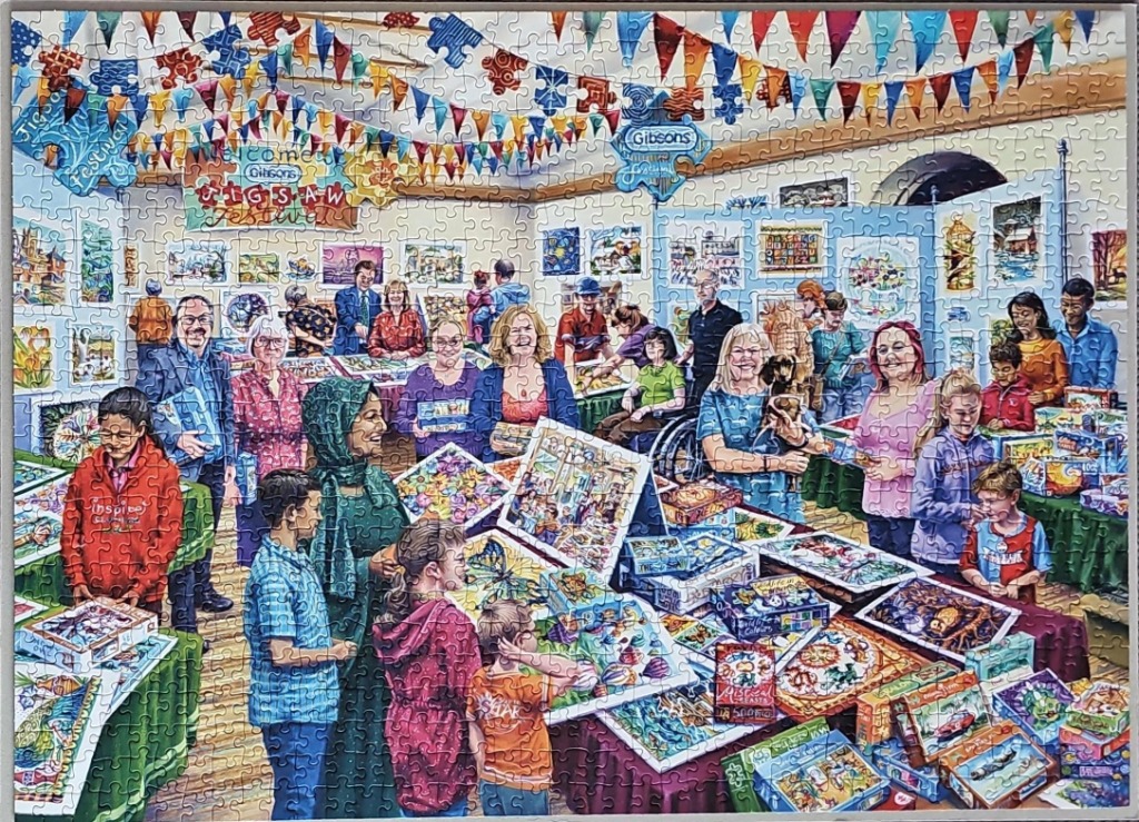An illustration of a busy indoor festival filled with people looking at jigsaw puzzle displays.