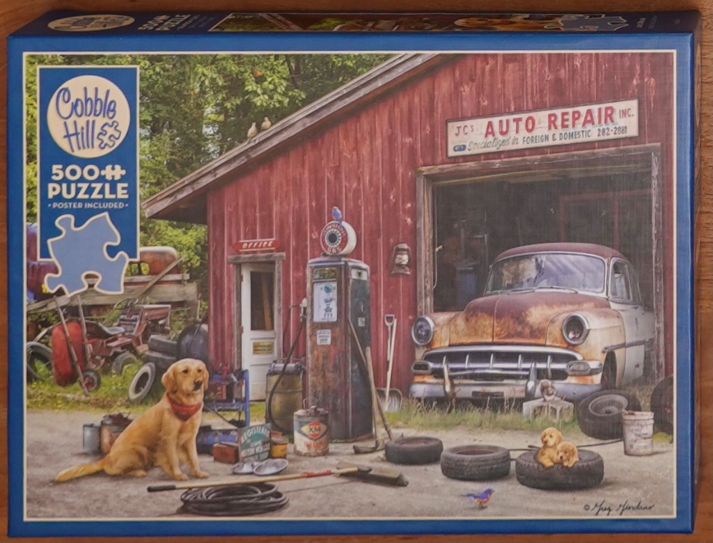 A nostalgic painting of a red barn auto repair shop with a golden retriever, an old car, and vintage gas pumps.