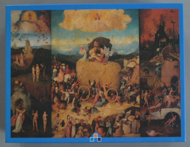 Triptych painting of The Haywain showing the creation of Eve on the left, a giant hay wagon in the center, and hell right.