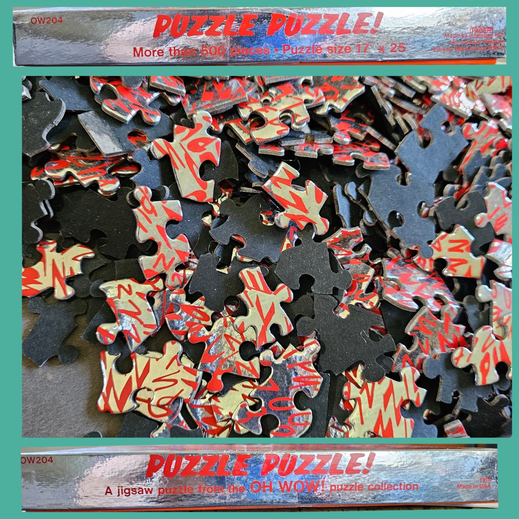 A pile of jigsaw puzzle pieces with a metallic silver and red abstract zig-zag pattern.