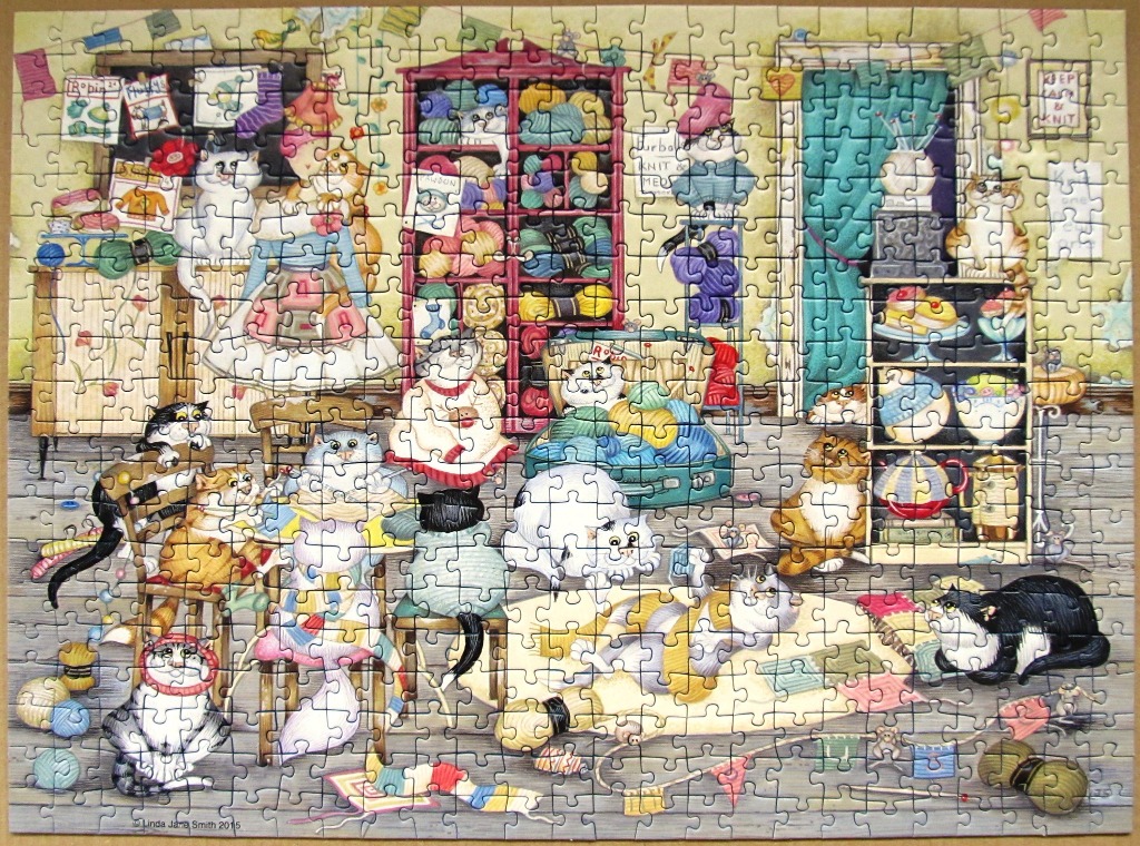 A whimsical illustration of many cats knitting and playing with yarn in a cozy room.