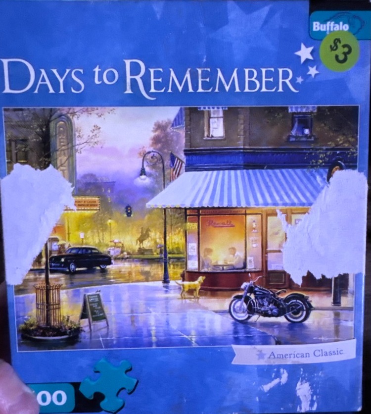 A nostalgic street scene featuring a corner cafe, a motorcycle, and a vintage car in the rain at twilight.