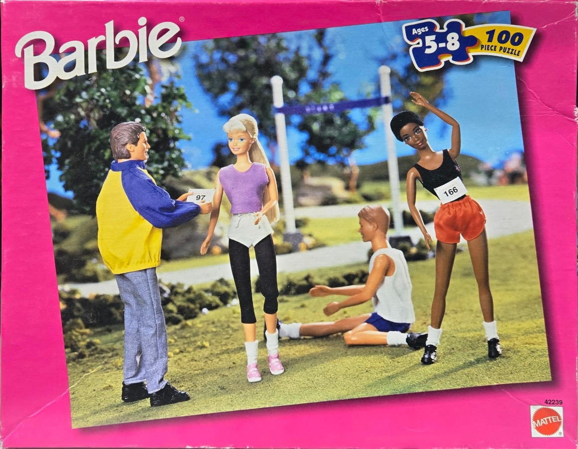 Four dolls dressed in athletic wear interacting in a park setting.