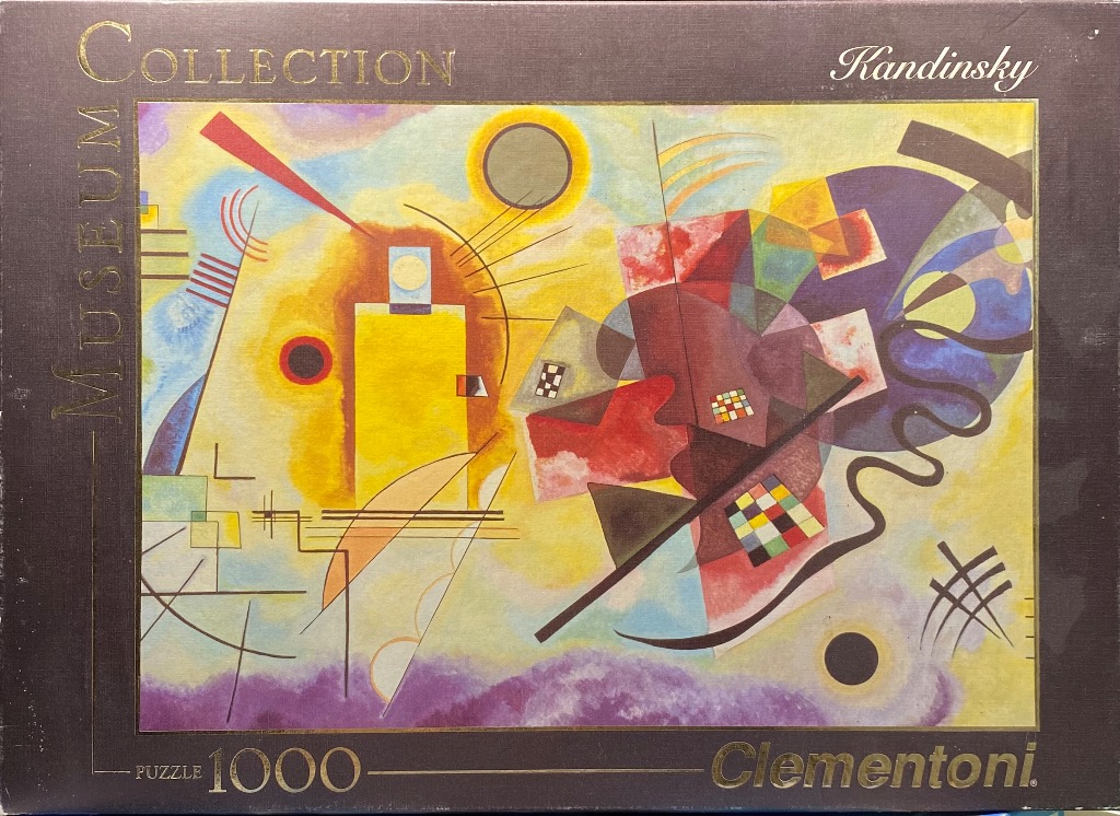 A Kandinsky abstract painting featuring yellow, red, and purple shapes with geometric lines and circles on a hazy field.