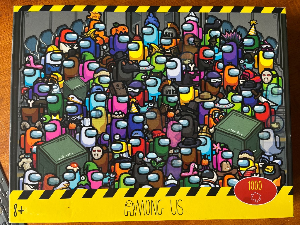 A crowded illustration of many colorful space-suited characters with various hats and accessories in a industrial room.