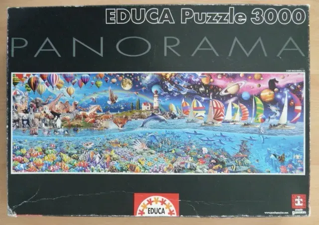 A panoramic fantasy scene showing land animals, a tropical reef, sailboats, and planets in a vibrant sky.