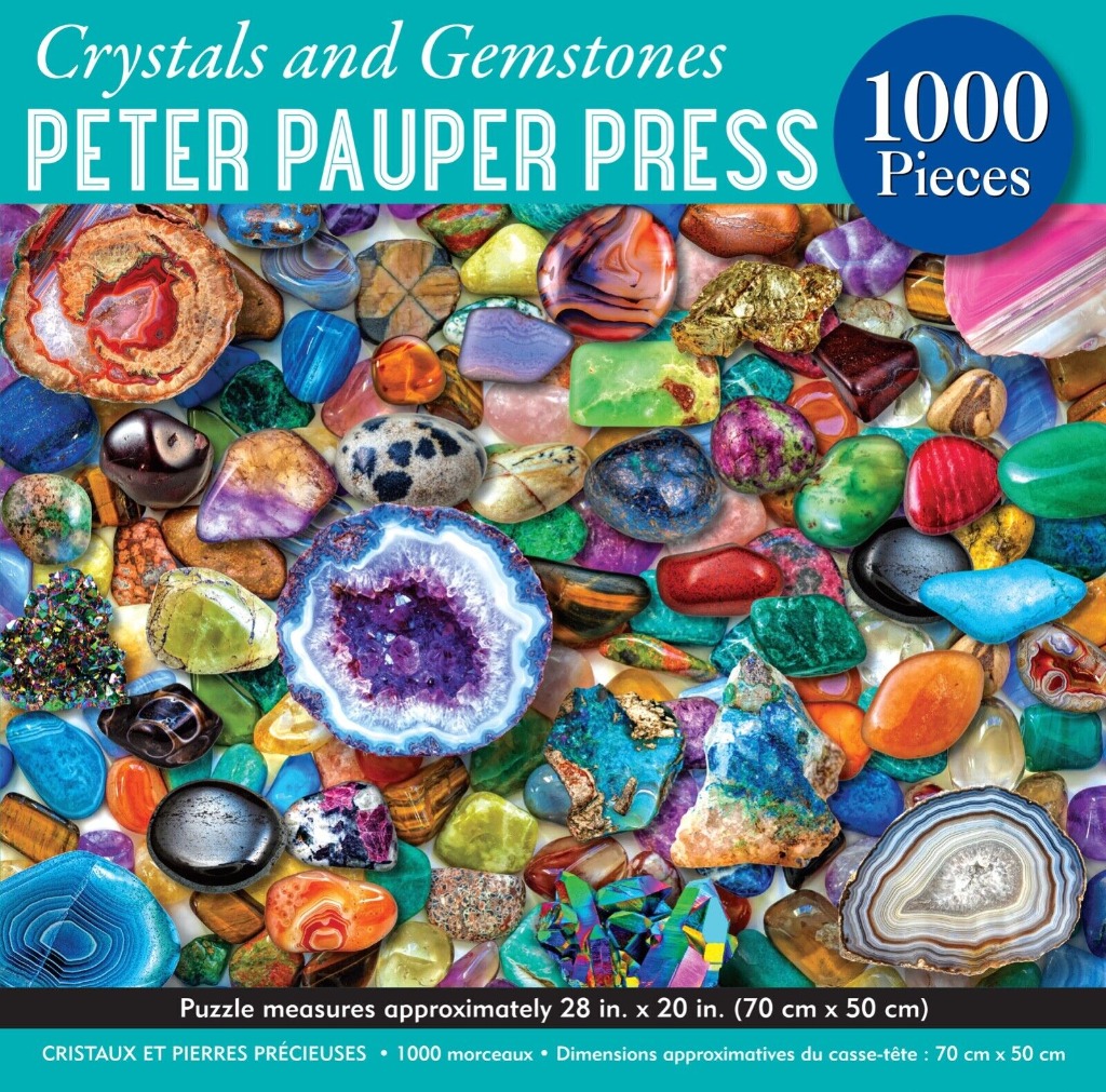 A collection of polished gemstones and crystals in a vibrant array of colors and shapes.
