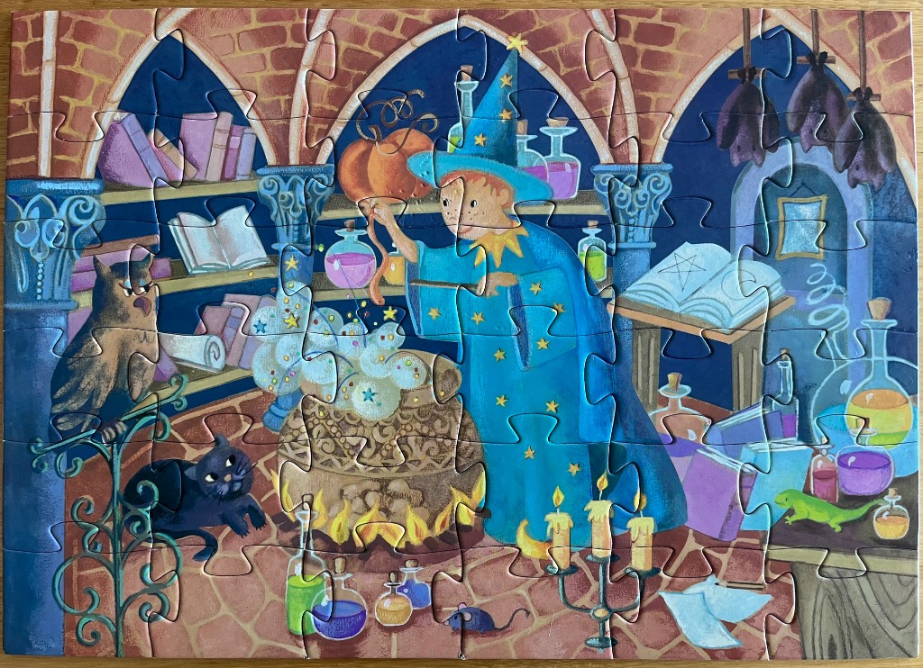 Illustration of a young wizard brewing a potion in a stone castle chamber with a cat, an owl, and various mystical items.