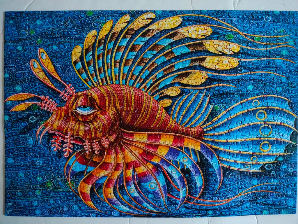 Artistic illustration of a stylized, vibrant lionfish swimming through a deep blue patterned ocean.