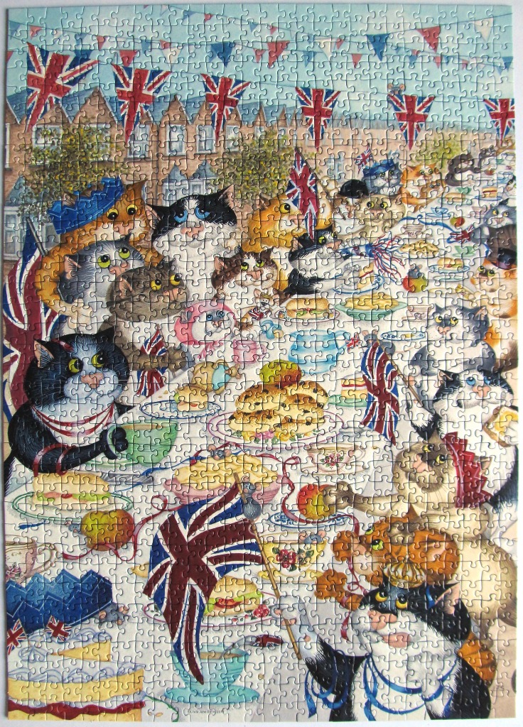 An illustration of many cats celebrating at a tea party with British flags and decorations.
