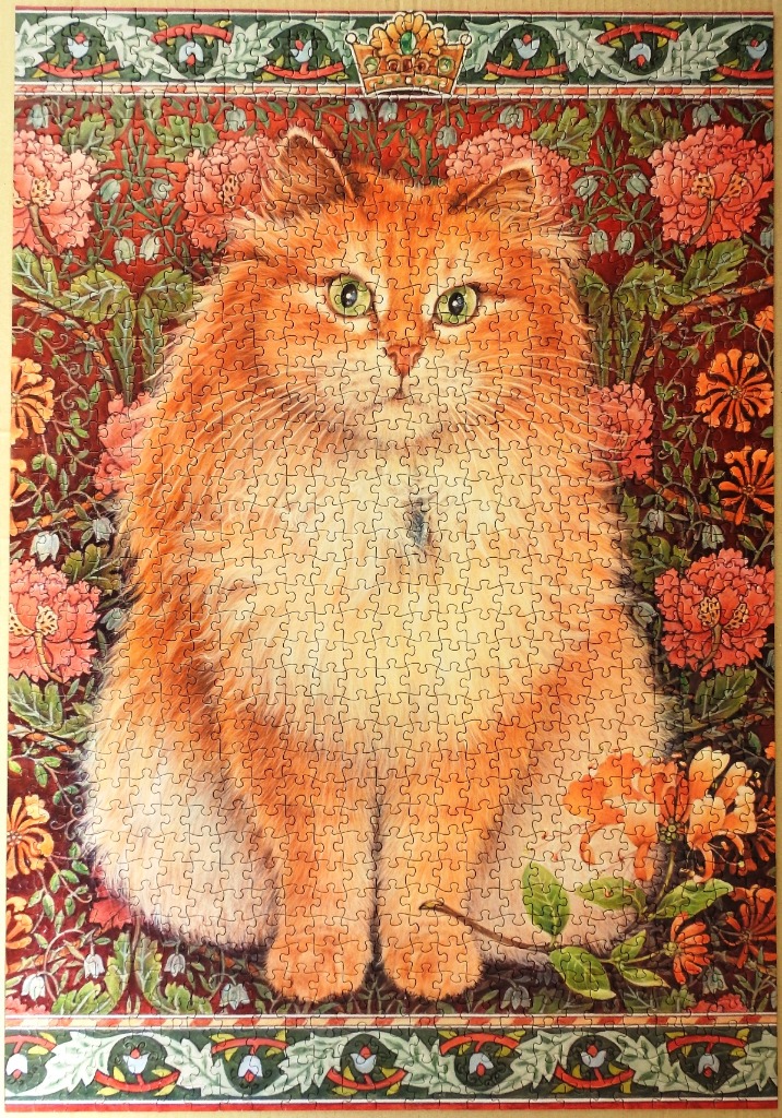 A long-haired ginger cat depicted in an ornate, William Morris-style botanical background with a golden crown.
