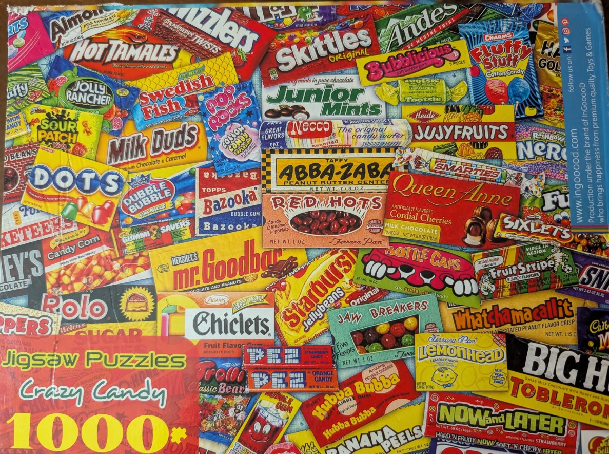 A dense, colorful collage of iconic vintage candy wrappers and boxes.