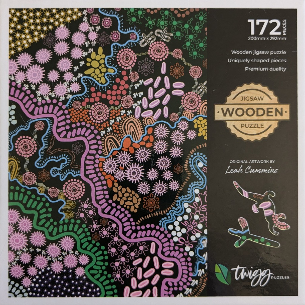 Indigenous-style Aboriginal artwork with dots, flowing lines, and circular motifs in pink, green, and yellow on black.