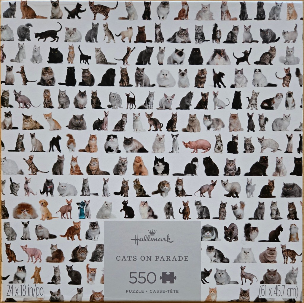 A collection of many different cat breeds and colors arranged in a grid pattern on a white background.