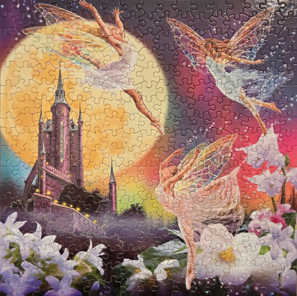 A fantasy illustration of three fairies dancing around a castle under a full moon.