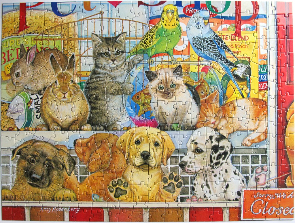 An illustration of various cute animals including puppies, kittens, bunnies, and birds in a pet shop setting.