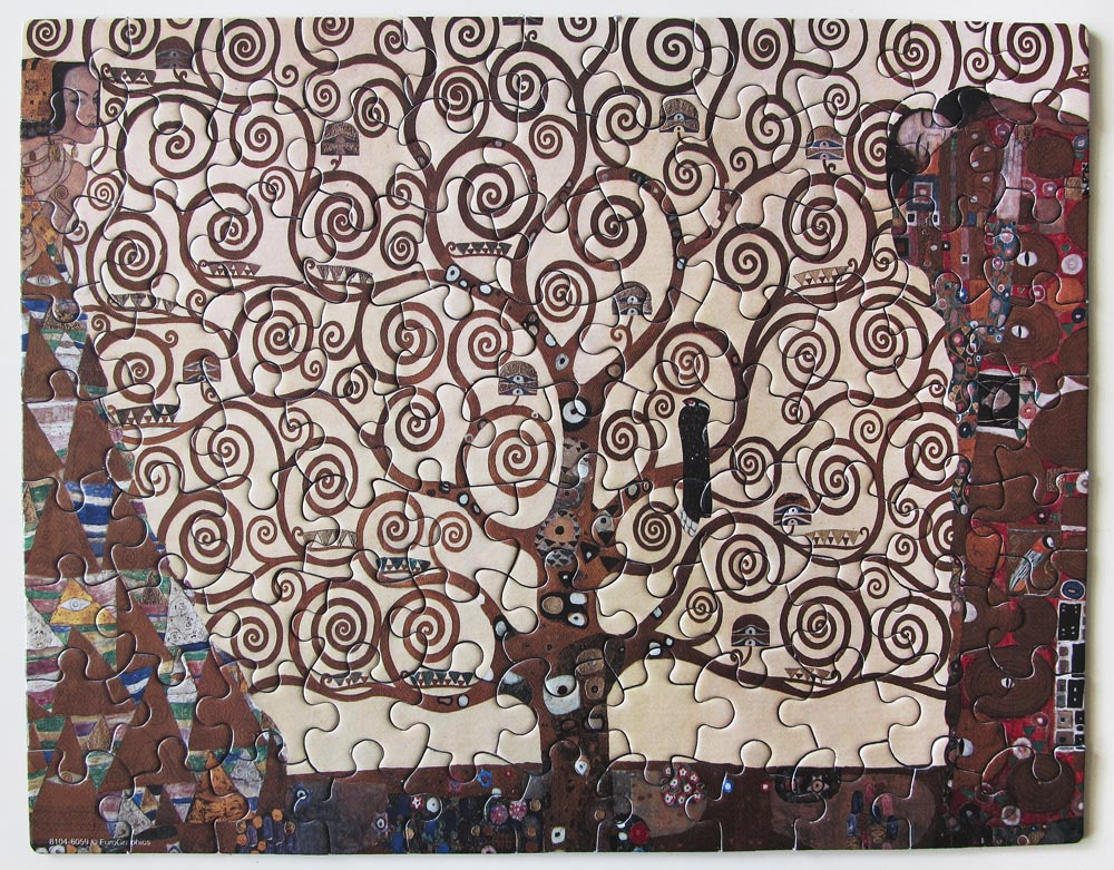 A reproduction of Gustav Klimt’s Tree of Life, featuring golden spiraling branches and stylized human figures.