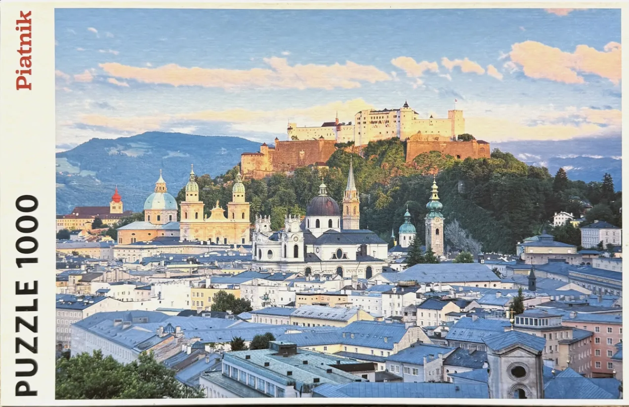 Panoramic view of Salzburg with Hohensalzburg Fortress and the city skyline at sunset