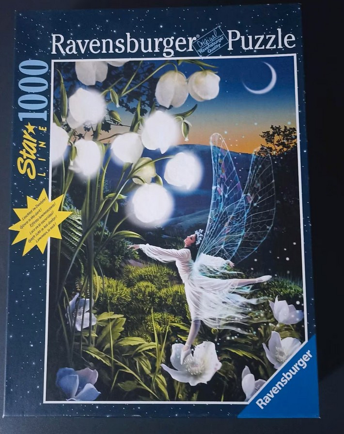 A fairy with translucent wings dancing near glowing white bell-shaped flowers under a moonlit night sky.