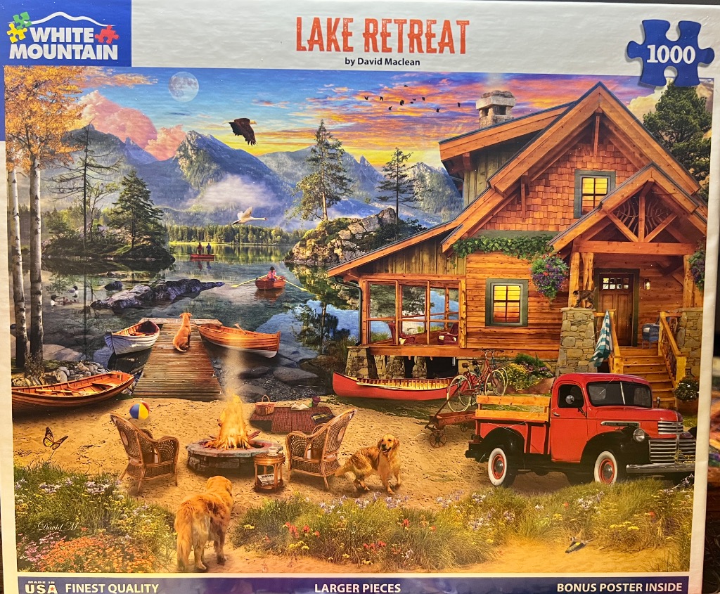 A peaceful lakeside cabin scene with dogs, a campfire, and a vintage red truck at sunset.