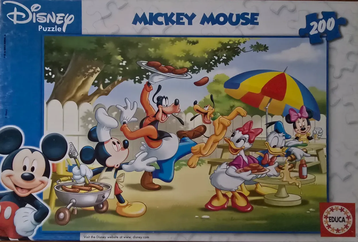 Animated characters Mickey, Goofy, Pluto, Daisy, Donald, and Minnie having a backyard barbecue.