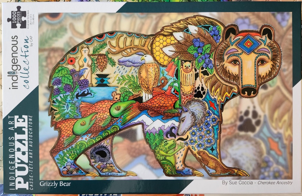 Stylized artwork of a grizzly bear filled with intricate illustrations of woodland animals and natural elements.