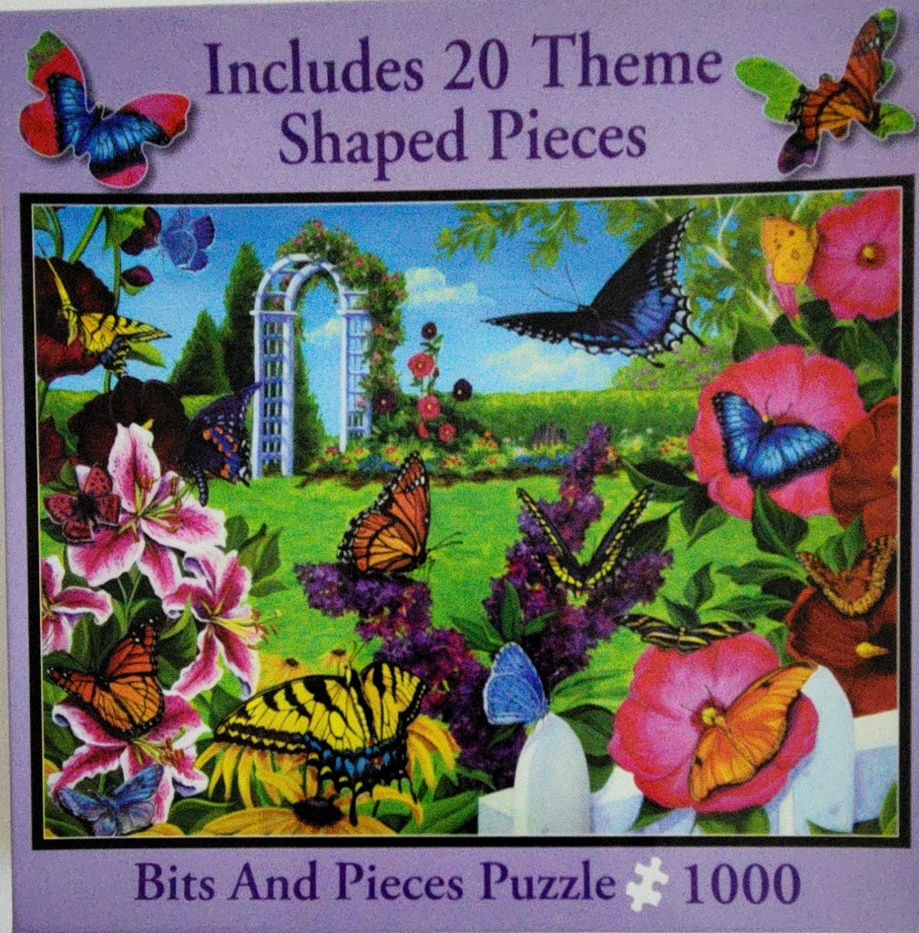 A lush summer garden filled with vibrant flowers and many colorful butterflies flying about.
