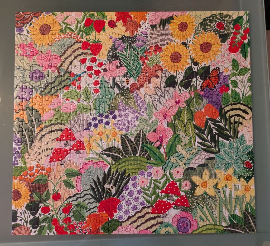 A dense, vibrant illustration of a garden filled with sunflowers, red mushrooms, flowers, and insects.