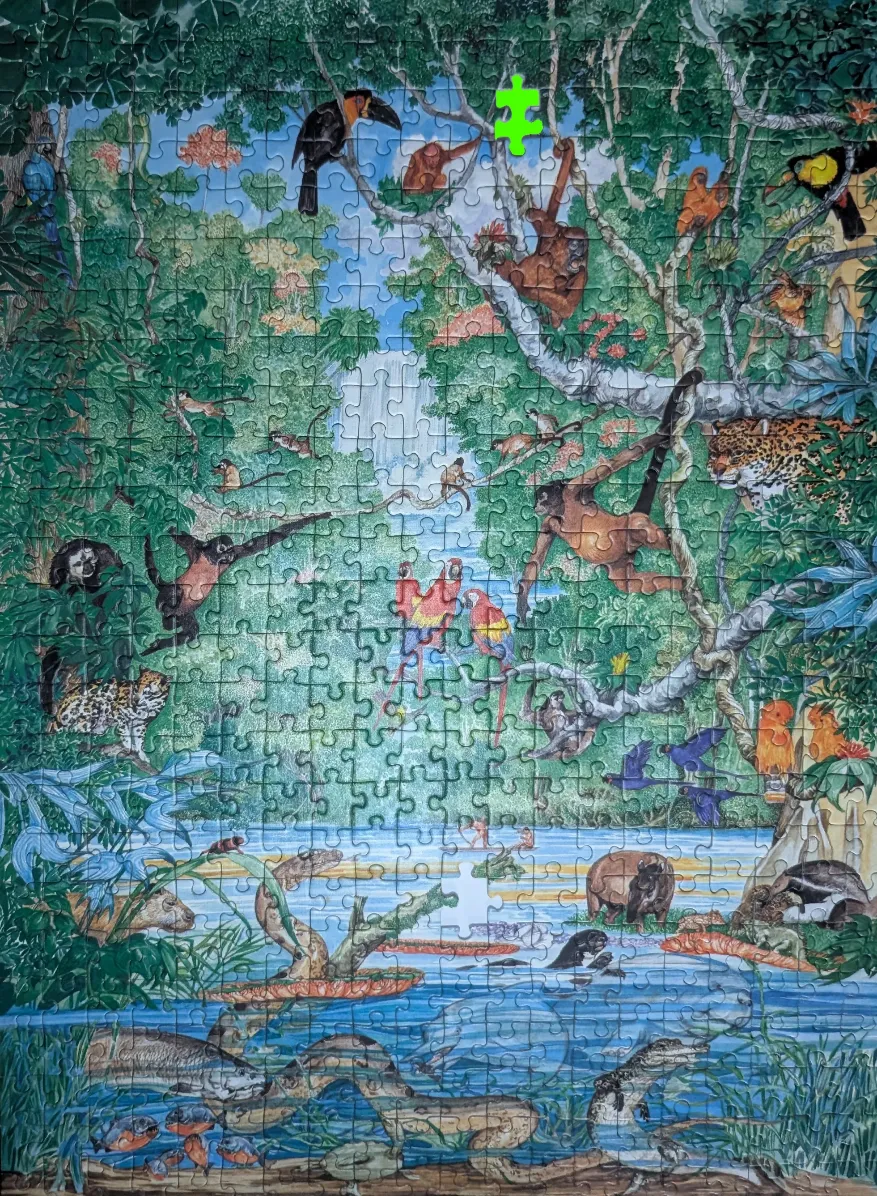 A lush rainforest scene teeming with diverse wildlife, including monkeys, birds, jaguars, and aquatic animals.