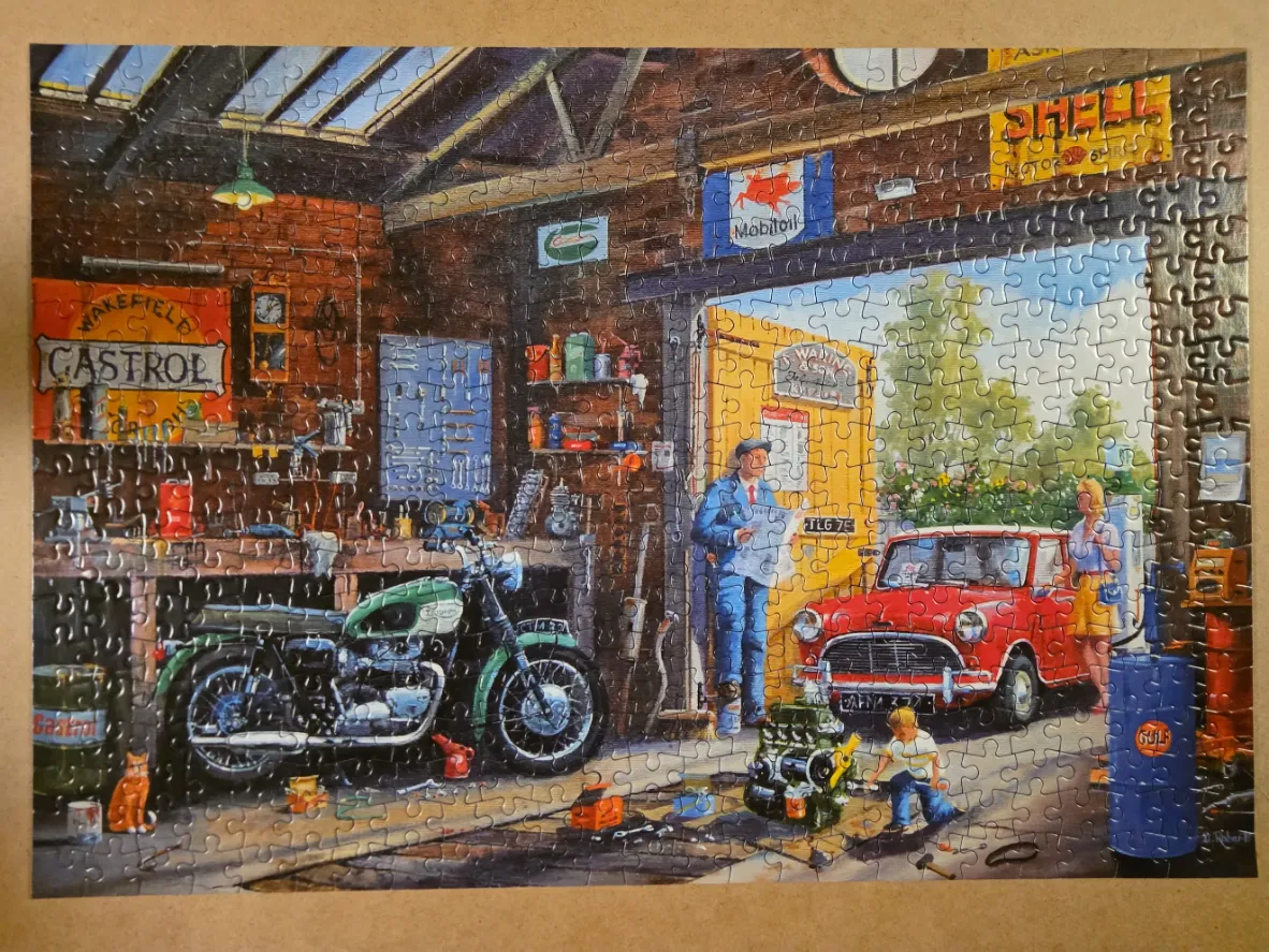 A nostalgic garage scene with a vintage motorcycle, a red car, and a family mechanic.