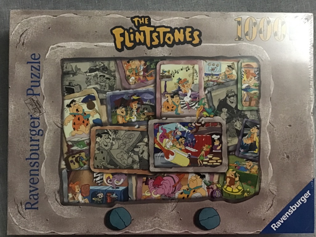 A collage of various scenes from The Flintstones television show framed within a stone television set.