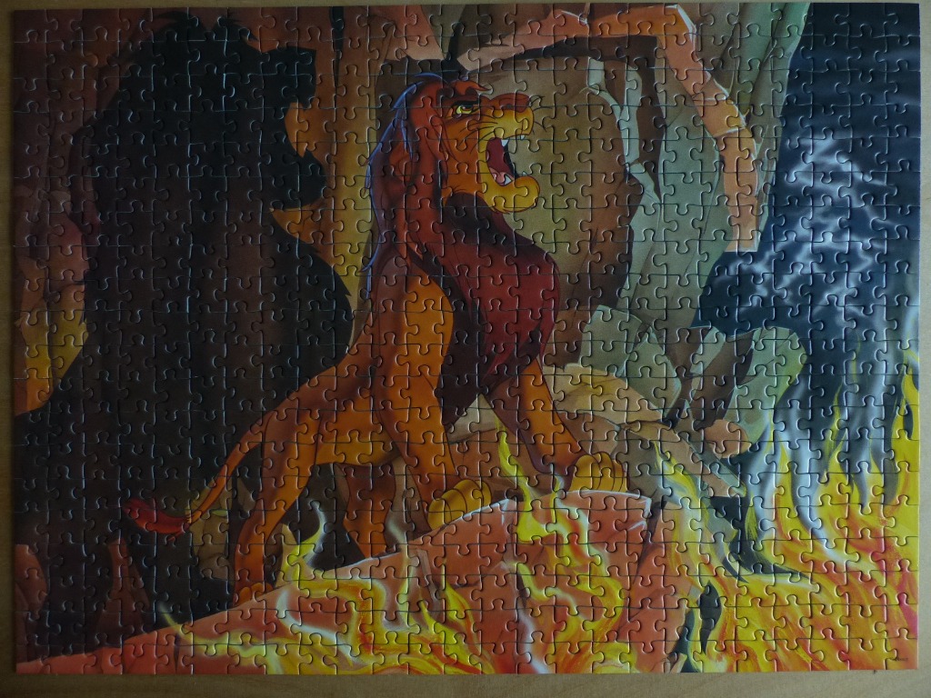Scar from The Lion King roaring against a backdrop of fire and shadow.