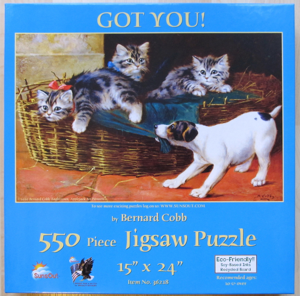 An oil painting of three kittens in a wicker basket being approached by a small terrier dog.