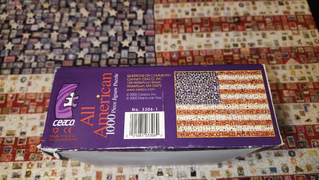 American flag made of stamps. Red, white, blue, purple box.