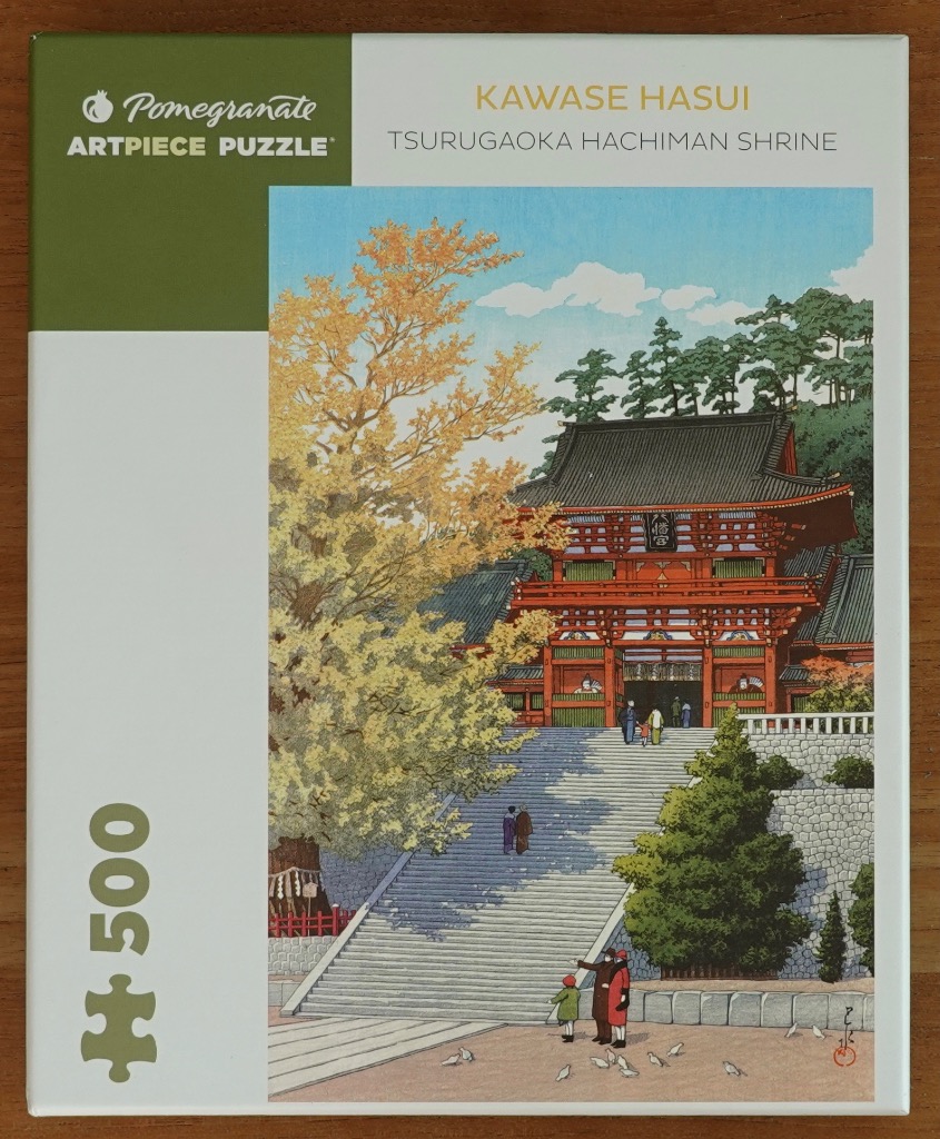 Woodblock-style print of Tsurugaoka Hachiman Shrine featuring a large ginkgo tree and people climbing stone stairs.