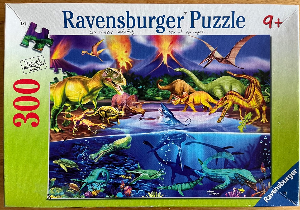 A split-level prehistoric illustration featuring land-dwelling dinosaurs and aquatic marine reptiles.