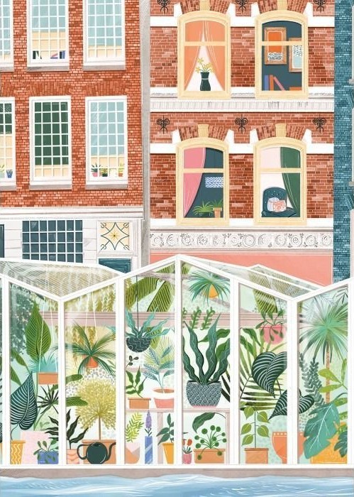 A lush greenhouse filled with potted plants sits in front of red brick urban apartment buildings.