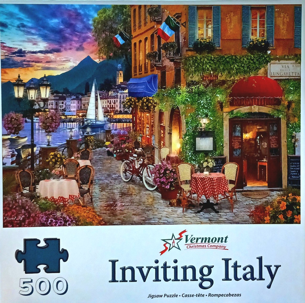 An Italian outdoor cafe scene at dusk featuring cobblestone paths, bistro tables, and a sunset over a mountain lake.