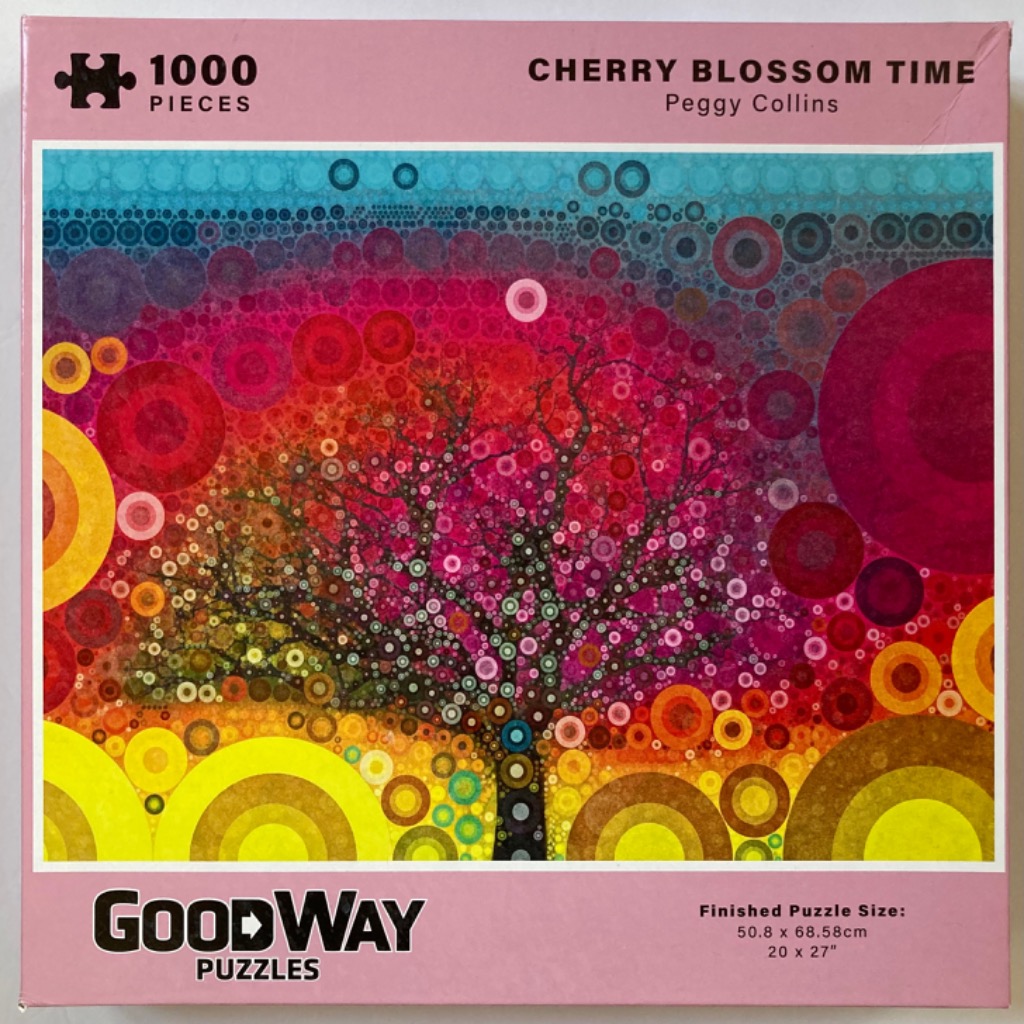 Abstract art of a dark-trunked tree covered in pink and multi-colored circles against a vibrant, circular background.