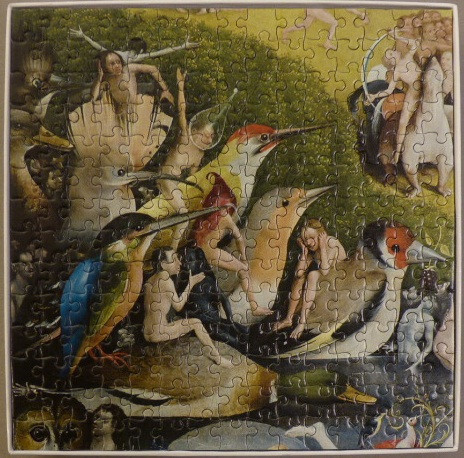 Detail from Bosch's Garden of Earthly Delights featuring oversized birds and nude figures.