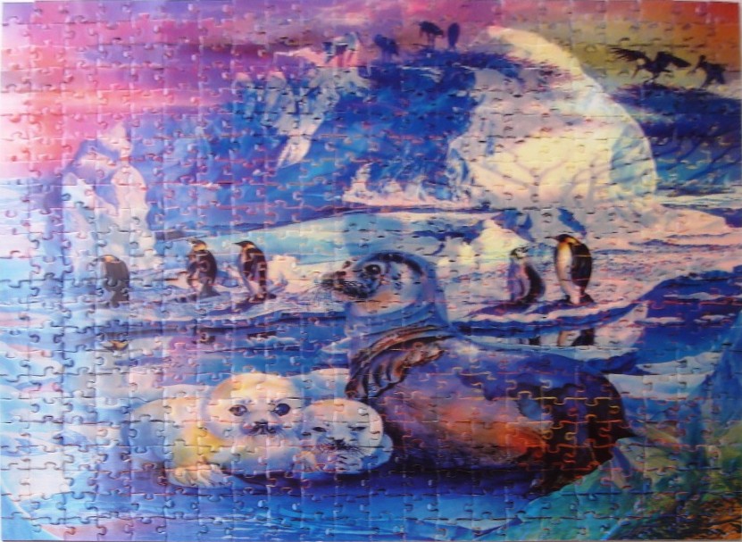 A mother seal and her pups resting on ice with penguins in the background under a vibrant sunset sky.