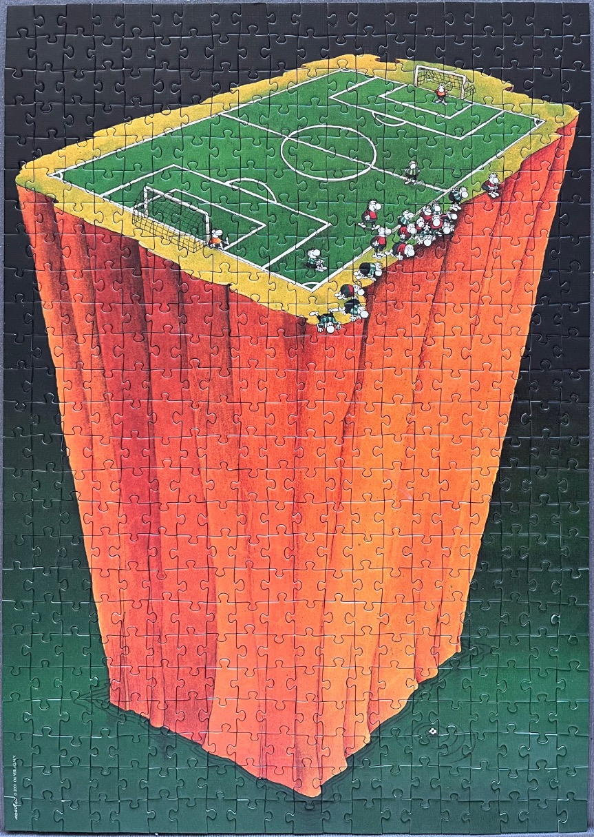 Cartoon of a soccer field perched on top of a giant floating orange monolith.
