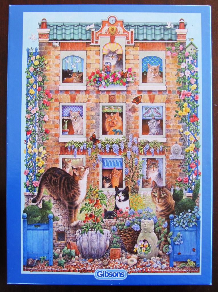 An illustration of a three-story brick house filled with numerous cats and vibrant flowers.