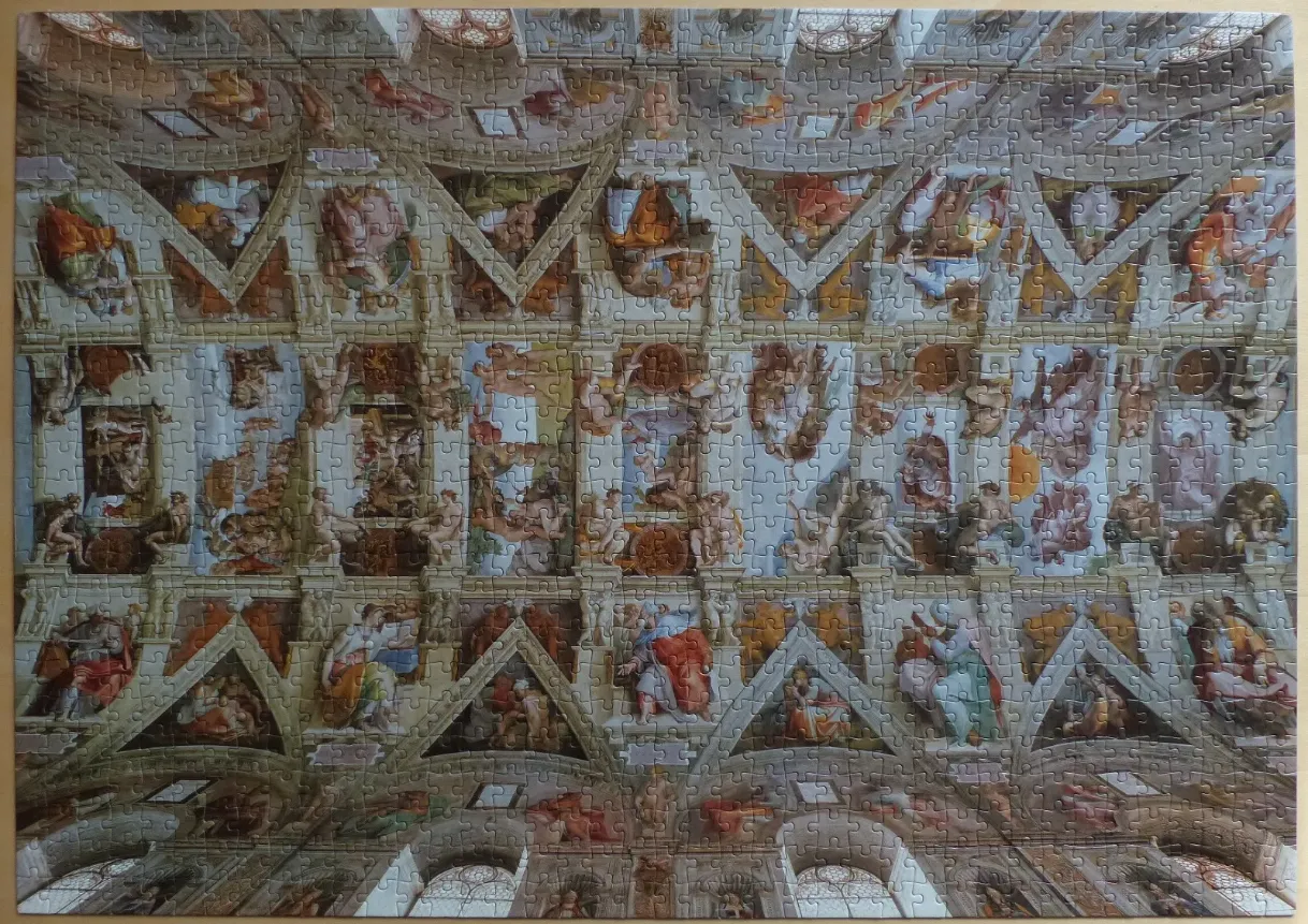 A reproduction of the Sistine Chapel ceiling painting depicting various biblical scenes and figures.