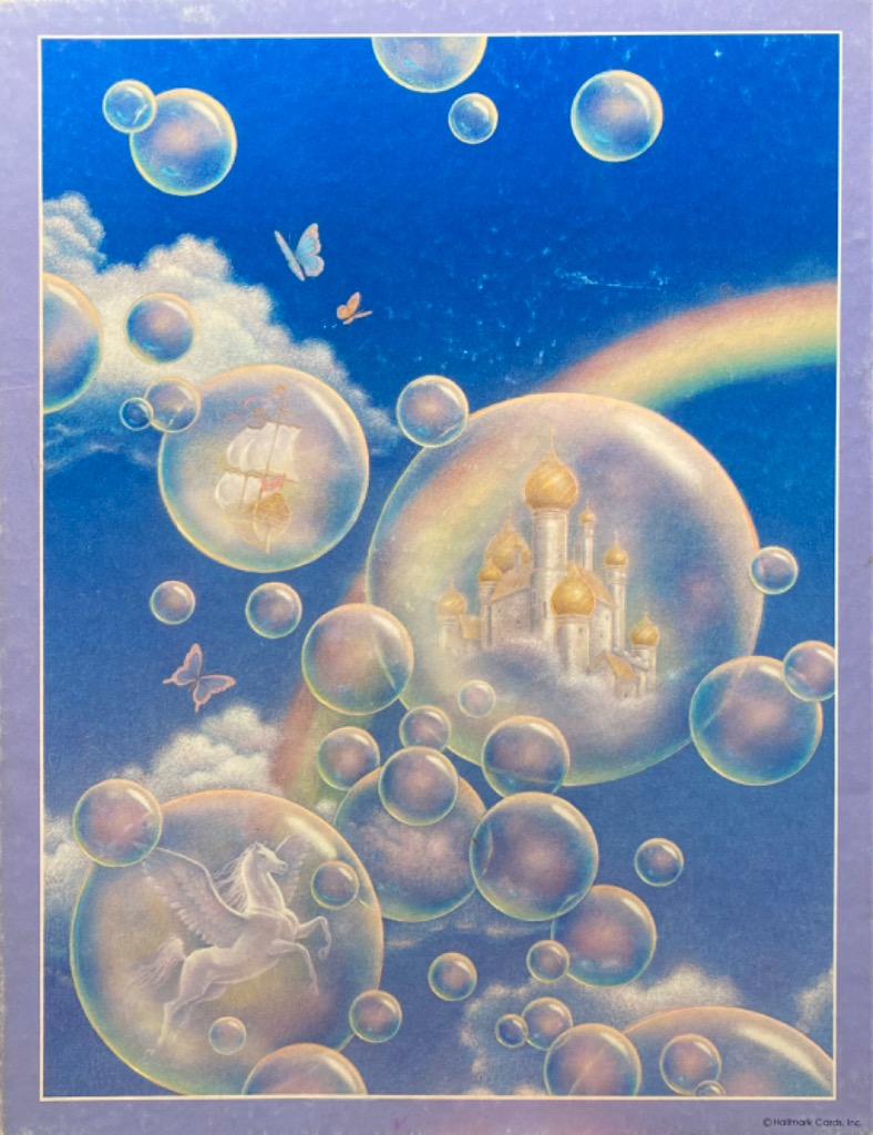 A fantasy illustration of a castle, ship, and pegasus inside iridescent bubbles floating in a bright blue sky.